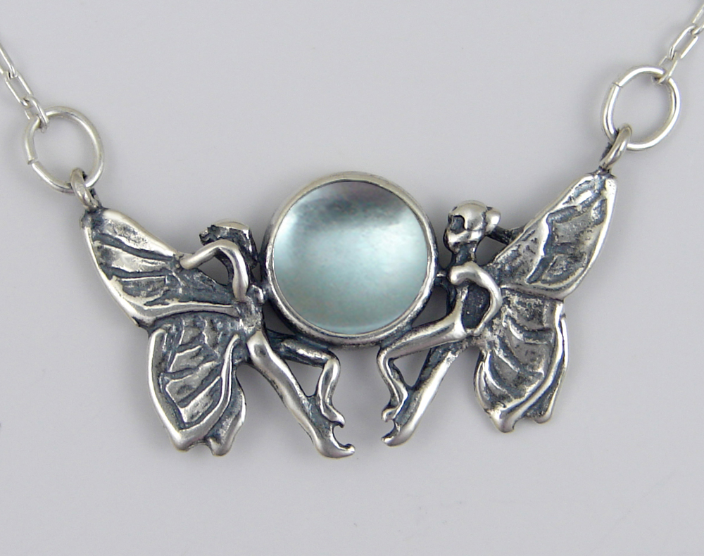 Sterling Silver Pair of Fairies Necklace With Blue Topaz